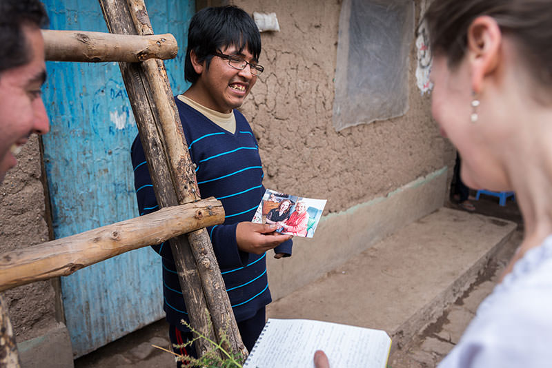 Former sponsored child Jhon held onto the letters and photo I sent.