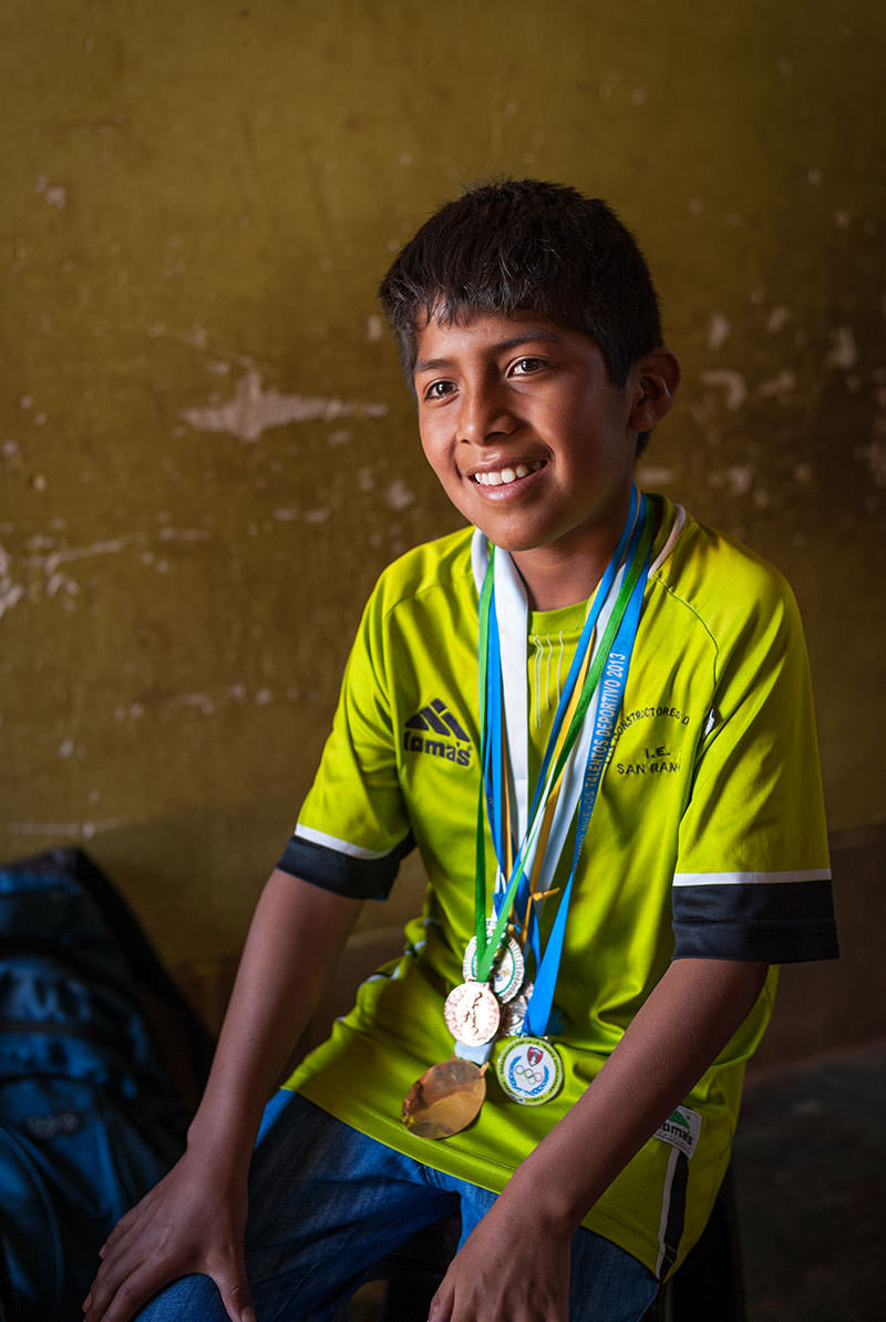 Today, big brother Joe describes 12-year-old Amilcar as “skilled in many things and studious. I’m proud of him.” Amilcar has amassed a collection of medals for soccer, basketball, track, and folk dancing. Like many young soccer fans in Huanta, he hopes someday to play the sport professionally.
