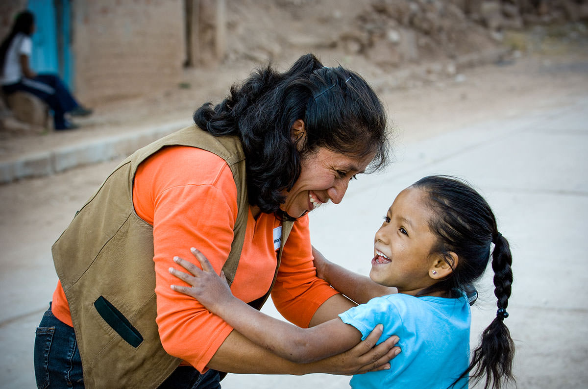 Maritza Flores Huaman, World Vision project coordinator in Huanta from 1998 to 2007, was a woman of strong faith and a positive influence on struggling families, especially mothers like Gladys Condor. A few months after this photo was taken in the summer of 2007, she nearly died in a car accident. But it was breast cancer that ultimately killed her in 2009.