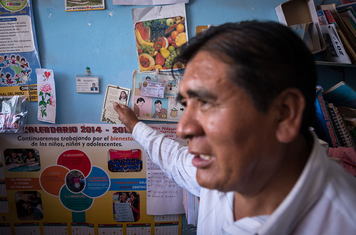 One of the many people who honor Maritza’s memory in Huanta, community leader Erineo Lapa, 55, keeps a flyer from her memorial service tacked on a bulletin board in his home.