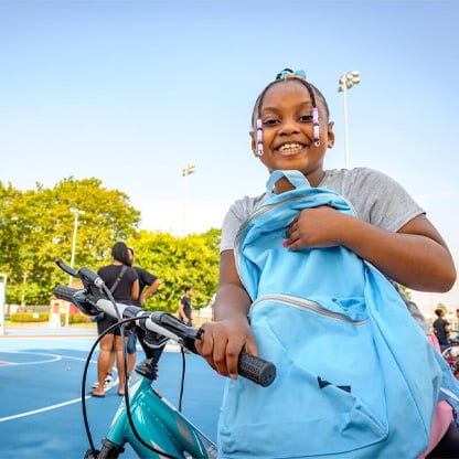 little girl with bike