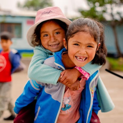 two girls smiling and happy