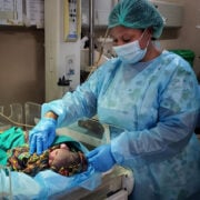 nurse with baby in hospital