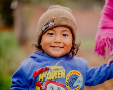 Smiling child in South America