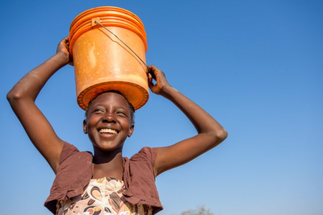 Everlyn's in school, her mother's garden is thriving, and her family's faith is stronger. Child sponsorship and clean water have made all the difference.