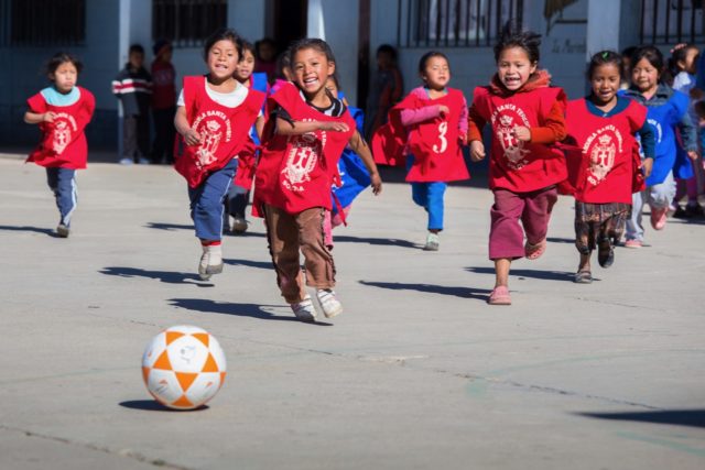 All around the world, boys and girls play the world’s most popular sport — the game we in the U.S. call soccer and the rest of the world calls football. We break down five benefits of soccer for kids.