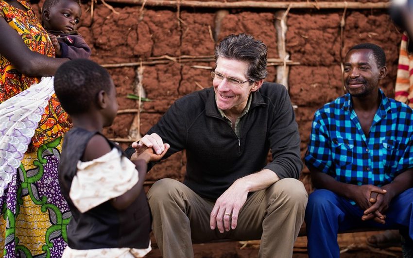 Dr. Paul Osteen meets Alice, a World Vision sponsored child, and her family in Butare, Rwanda.
