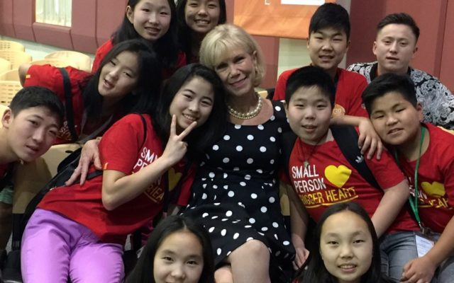 Marilee visits with the Blue Sky Choir with the World Vision Malaysia staff.