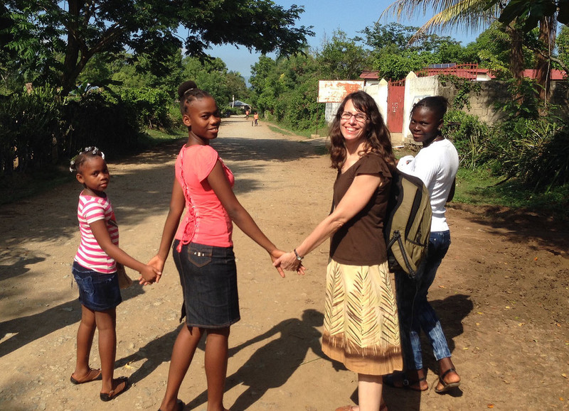 World Vision sponsor with her sponsored children in Haiti.