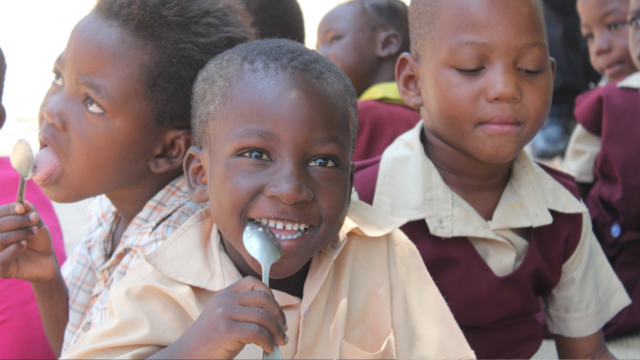 Having grown up on a family farm in Iowa, our expert Dan Norell reflects on his work today supporting rural farmers in Zimbabwe for National Farmer’s Day.