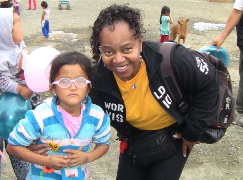 Rev. Belynda Gentry visits with children in Peru. (Photo courtesy of Belinda Gentry)