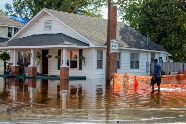 A man walks through flooding from Hurricane Florence in Lumberton, North Carolina.
