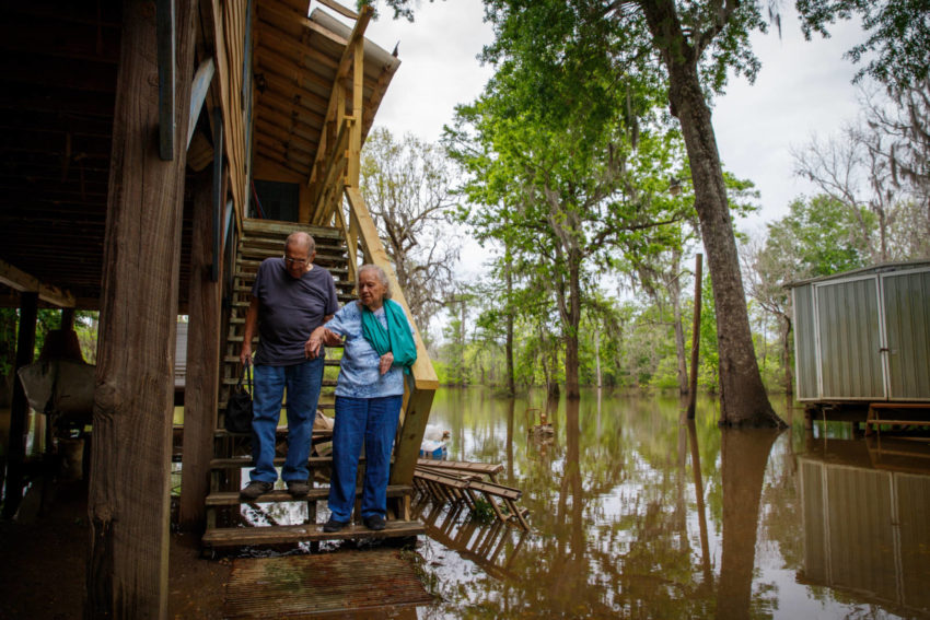 In April, John Harris helped his wife, LaDell, down the steps in front of their home along the shores of the Neches River near Vidor, Texas. She had slipped and hurt her arm while waiting days for floodwaters to clear from the porch steps. Their home was nearly destroyed by 15-foot floodwaters during Hurricane Harvey in August 2017. World Vision and its local partner, Wings of Promise led by Pastor Skipper Sauls, helped the couple rebuild with new appliances, Sheetrock, furniture, insulation, light fixtures, and other materials. John and LaDell were able to enjoy their cozy rebuilt riverside home together for a few more months in 2018 before John lost his fight with cancer in August. “During the storm, we were sitting here, helpless,” LaDell says. “These people (Pastor Sauls, and other community members) have been our angels.”