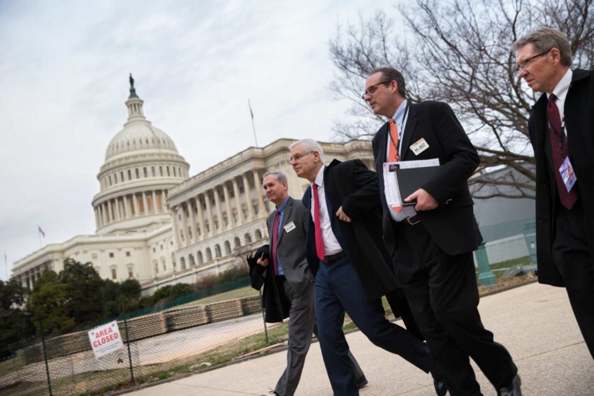World Vision representatives walk for a meeting with a congressman in Washington, D.C.