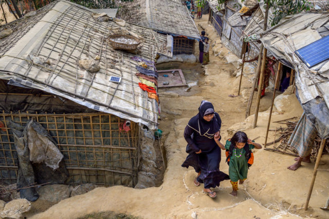 Jannatul, 5, and her mother, Salima, walk home from a World Vision Child-friendly Space in the refugee camp where they live in Bangladesh. Close to 1 million people live in the refugee camps in Cox’s Bazar, Bangladesh. Most have fled their homeland since August 2017.