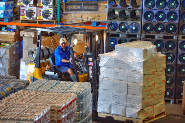 As Hurricane Dorian approaches the Florida Atlantic coast, Frank Rincon, director of the Benison Center unloads World Vision relief supplies for staging at a warehouse in Immokalee.