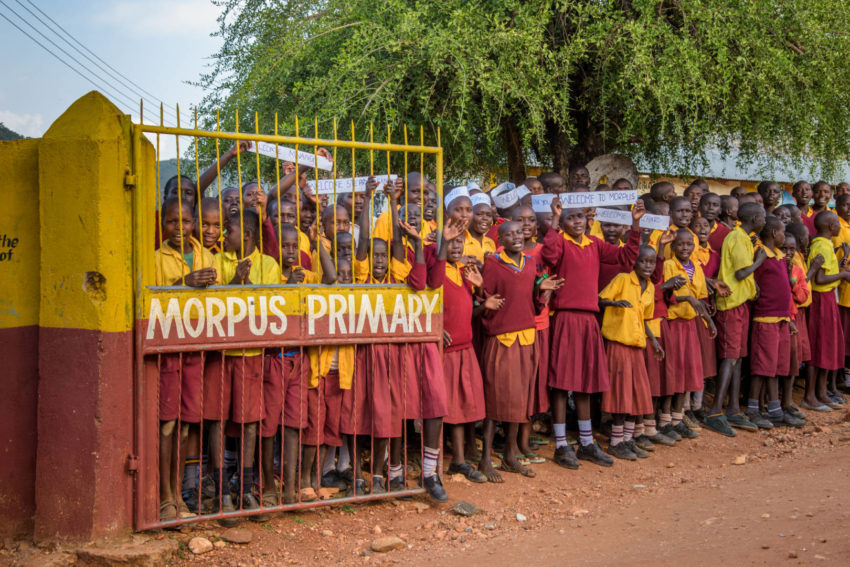 Students line the entrance to Morpus Primary School.
