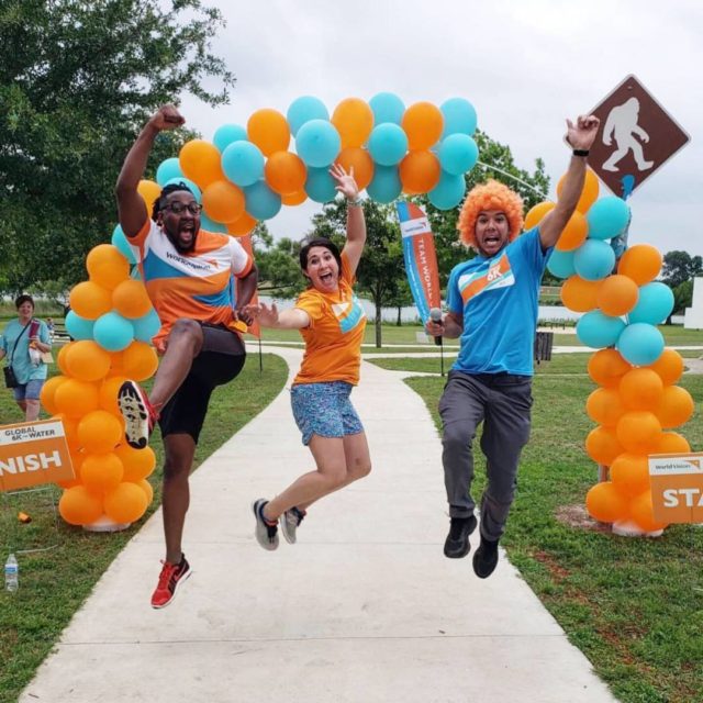 Participants at a Global 6K for Water site in Austin, Texas, jump for joy at the 2019 event. Leap into the new year with that kind of excitement, and this could be you.