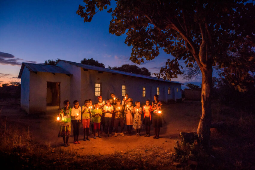 Children hold candles and sing in Moyo, Zambia. Join author Danielle Strickland as she pauses to pray during this especially chaotic Christmas season. Take postures of surrender, generosity, and mission, taking time to build toward a peaceful life in the Advent season. 