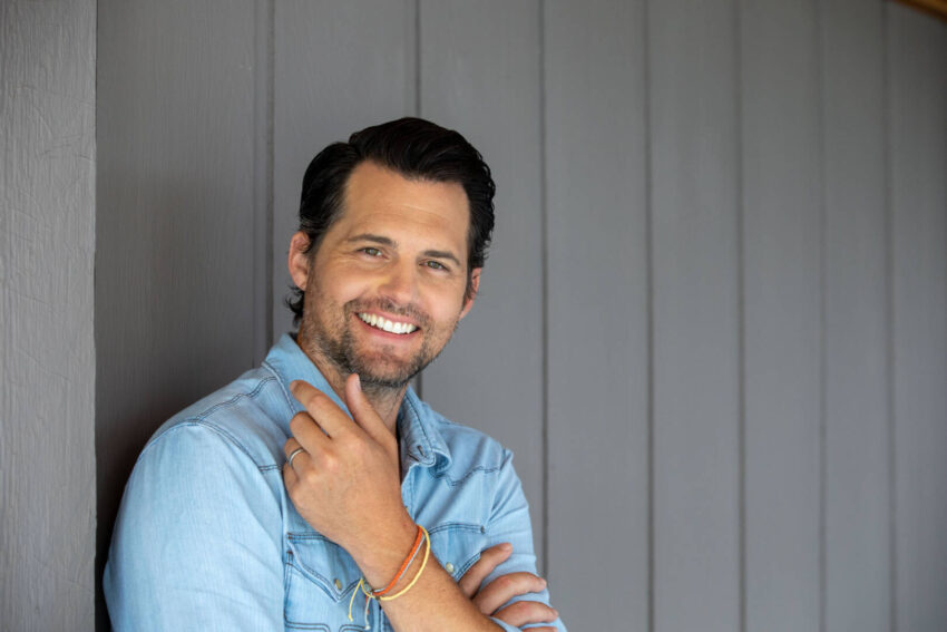 Kristoffer Polaha wears the handcrafted waxed string bracelets he designed for the 2021 World Vision Gift Catalog.