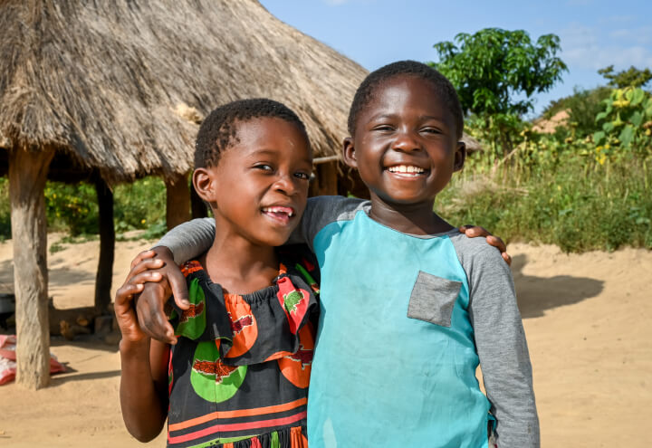 Sponsored children smiling in their community