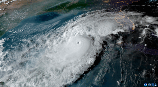 A massive swirling cloud formation over ocean and land during Hurricane Milton in October 2024, taken by a NOAA satellite.