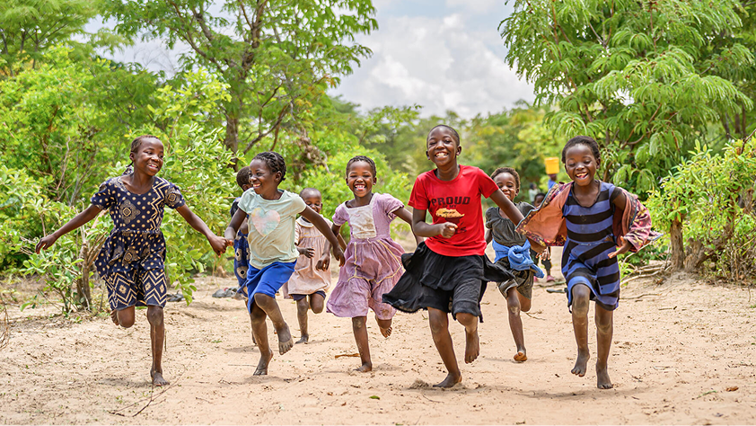 kids smiling and running