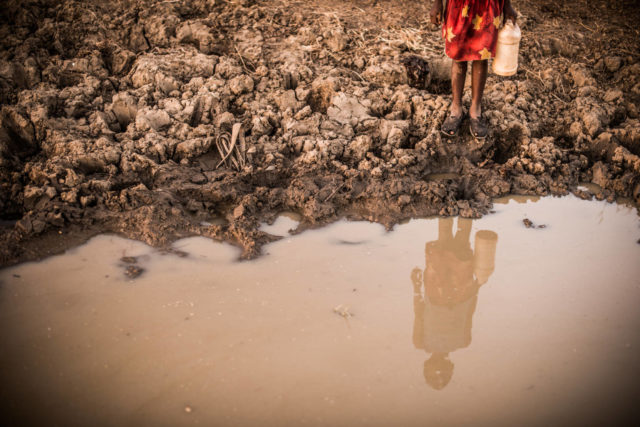 Dorcas, 9, carried dirty water home four times a day from a pond where animals drank, and sometimes died. Everything changed when World Vision dug a well. Now she has clean water.