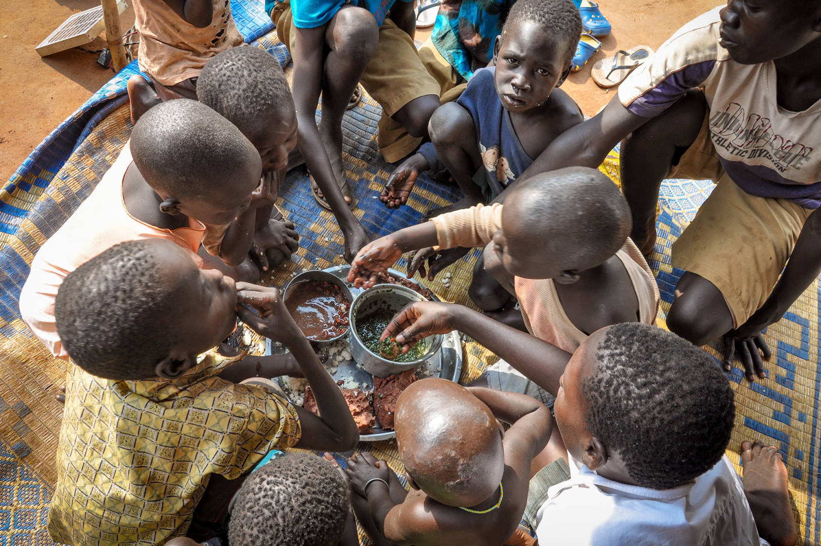 South Sudanese refugees in Uganda, children, hunger,