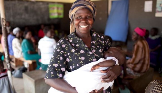 Igelo Hellen and baby waiting for medicine at the Kamuda Health Center in Uganda. PHOTO: World Vision