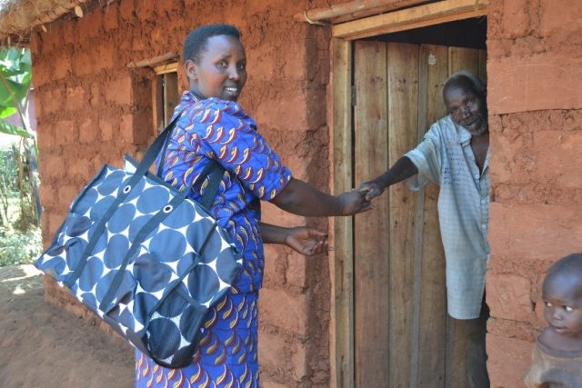 Health educator Renathe lives in Burundi and uses her Thirty-One Gifts tote bag to carry her teaching materials as she travels throughout her community. PHOTO: World Vision