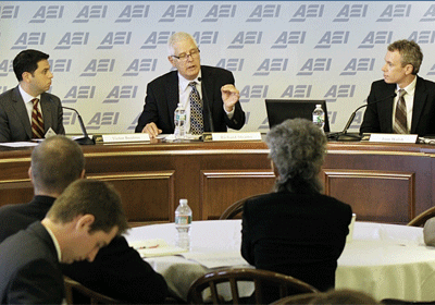 Victor Boutros (L), World Vision President Richard Stearns, and Tom Walsh (R) discuss the importance of fighting for the less fortunate at the 2014 American Enterprise Institute's Evangelical Leadership Summit in Washington, September 10, 2014.